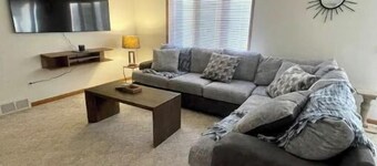 Family size home close to hospitals and schools. 2 Car garage & deck