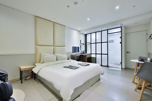 Kamar | Seprai premium, Wi-Fi gratis, dan seprai linen