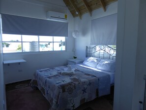 Down duvets, in-room safe, laptop workspace, blackout curtains - CortLang Vacation Rentals, El Pueblito (Puerto Plata)