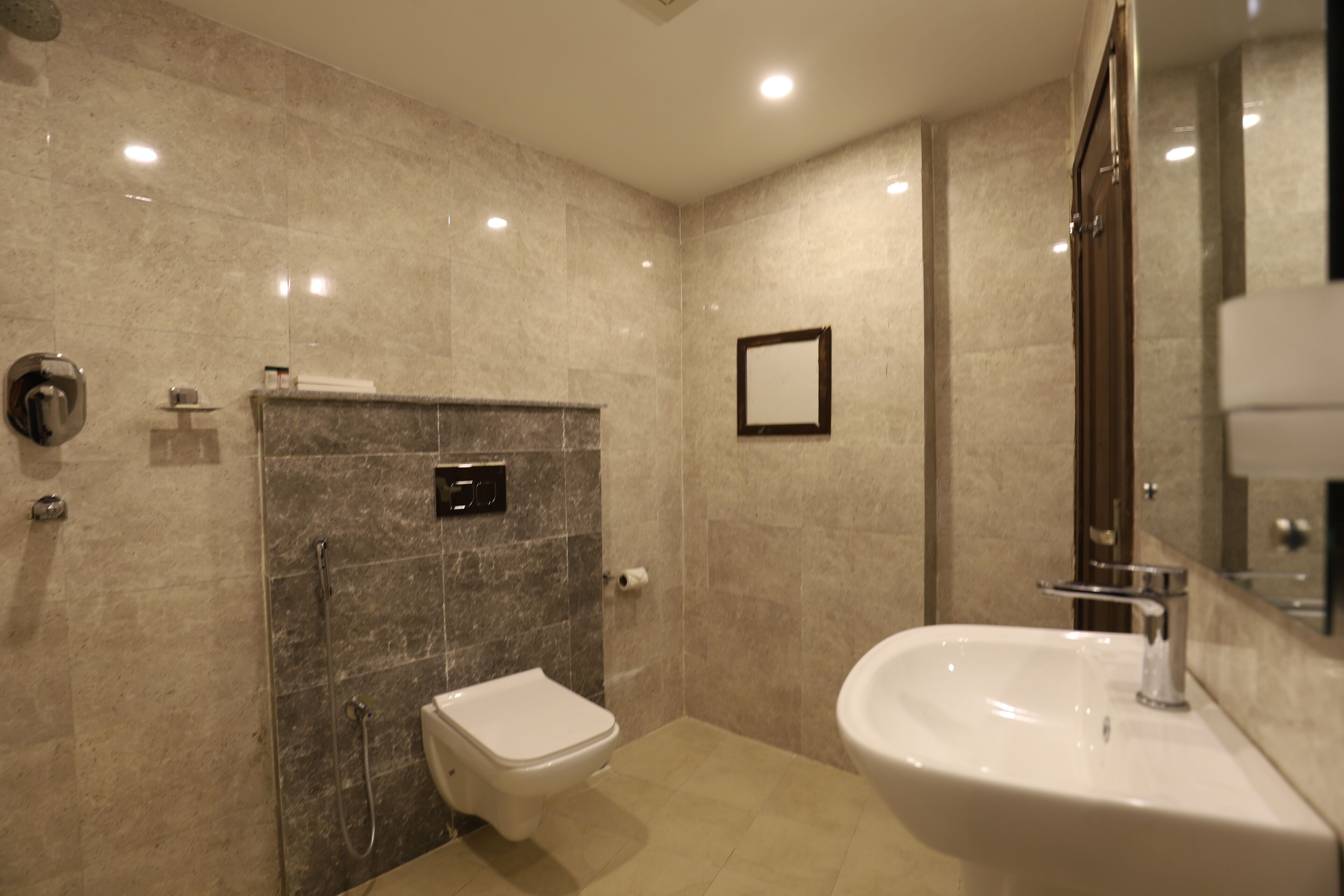 deluxe double room | bathroom | deep-soaking bathtub, rainfall showerhead, hair dryer, slippers