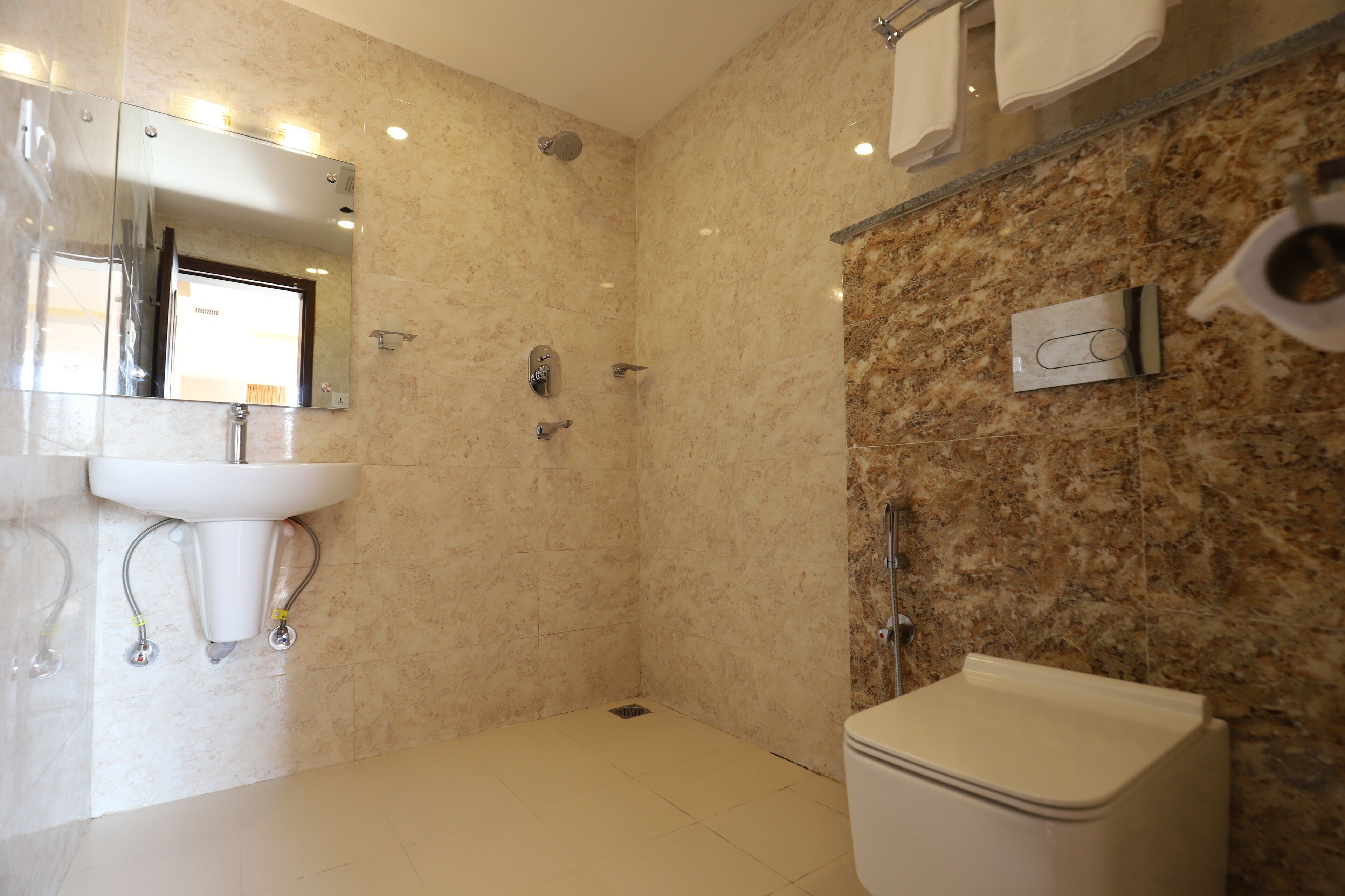 deluxe twin room | bathroom | deep-soaking bathtub, rainfall showerhead, hair dryer, slippers