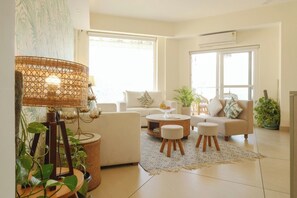 Akash with Ganga View, Balcony and Sit Out | Living area | LED TV