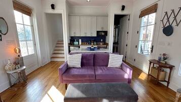 Smart TV, fireplace, books, stereo