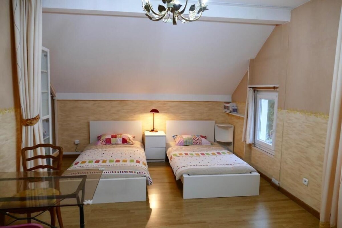 Premium bedding, desk, laptop workspace, soundproofing