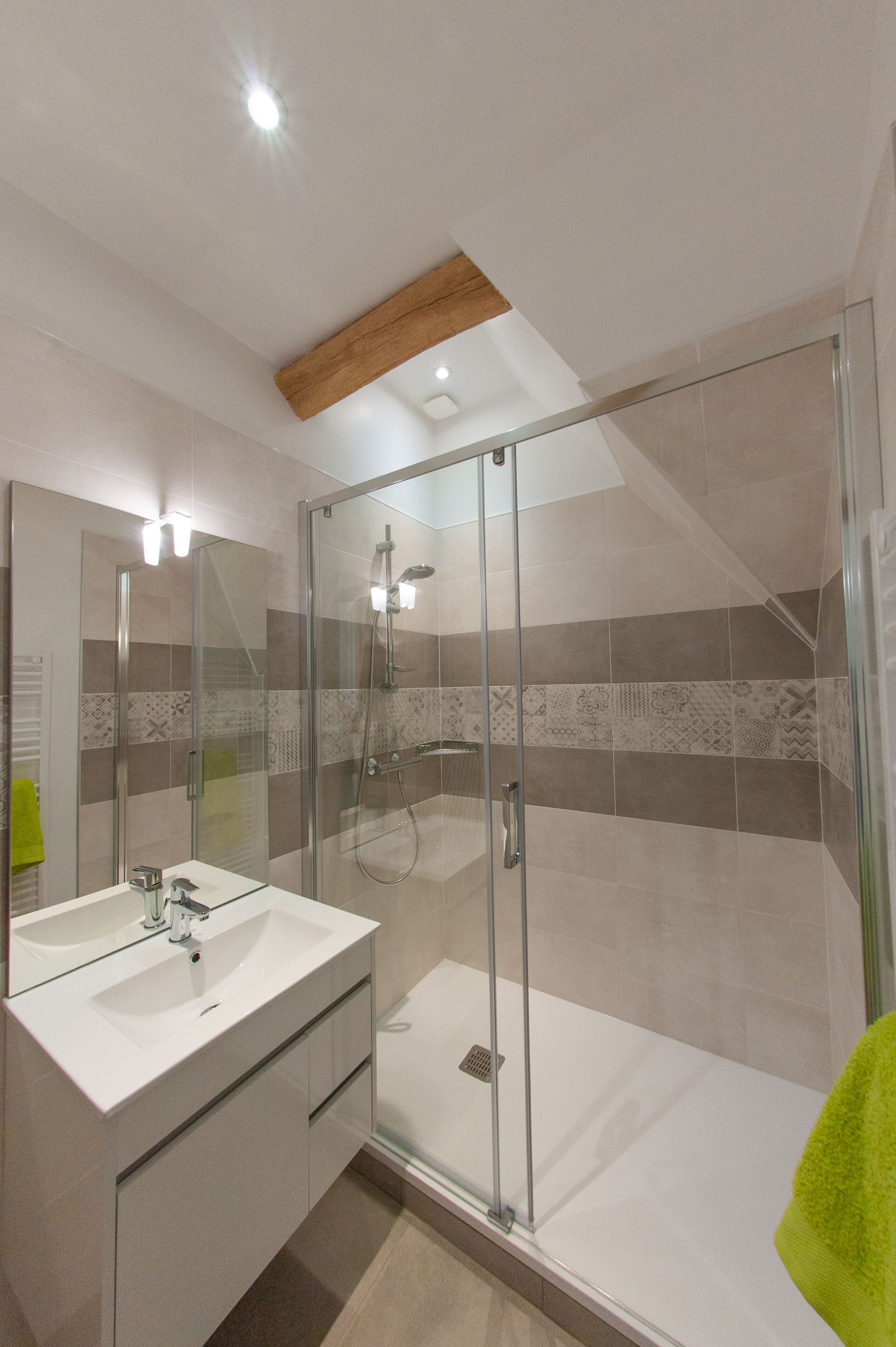 Shower, hair dryer, towels, toilet paper