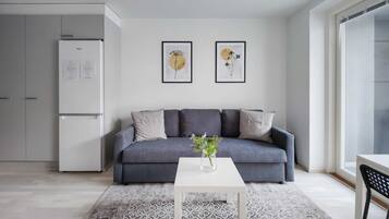 Premium Apartment | Living area | 40-inch Smart TV with cable channels, TV