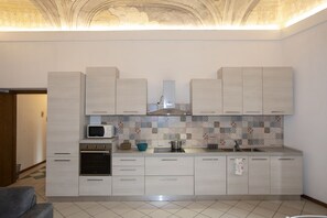 Microwave, dishwasher, dining tables