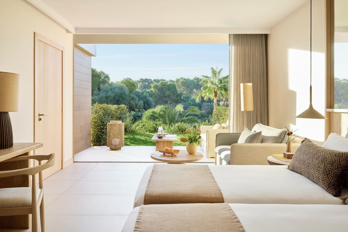 Habitació familiar, vistes al jardí | 1 dormitori, minibar i caixa forta a l'habitació