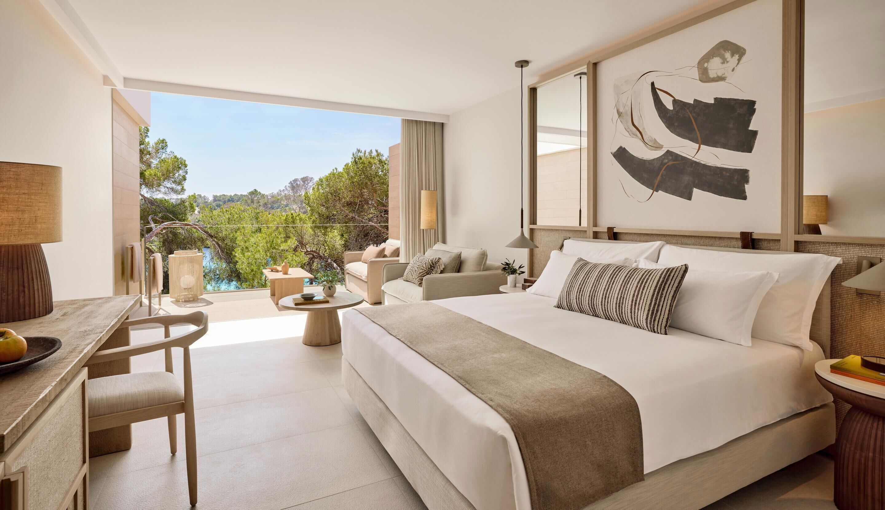 Superior Double Room, Partial Sea View | Minibar, in-room safe, laptop workspace, blackout drapes