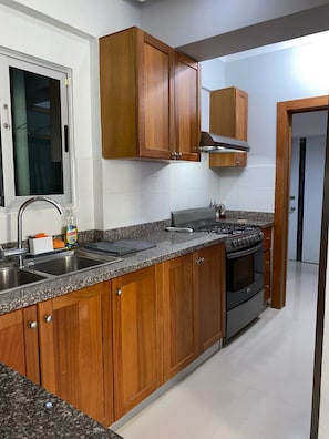 Fridge, oven, coffee/tea maker, toaster