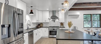 Private, modern home with river view, on 48 acres