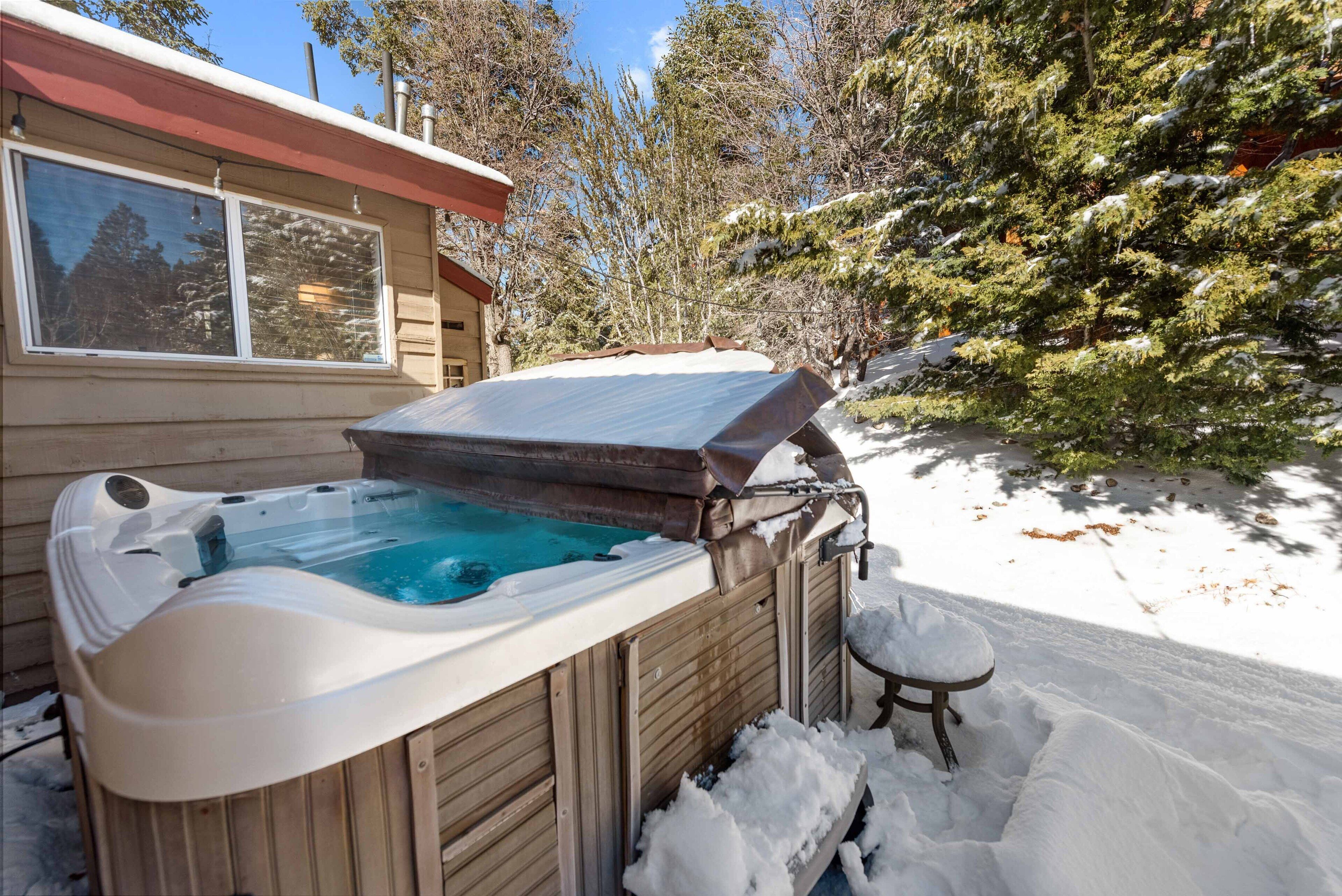 Pet-friendly home with wraparound deck, mountain views, hot tub, near slopes!