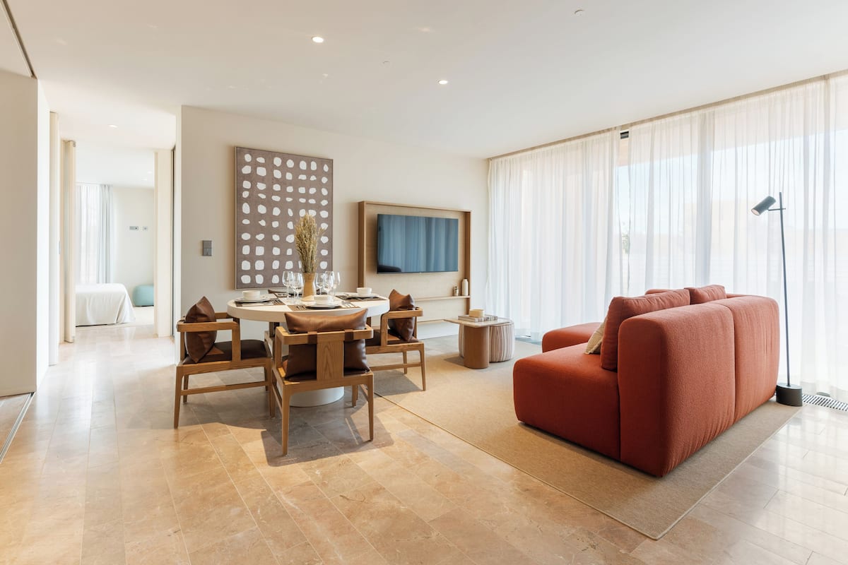 Signature Apartment, 3 Bedrooms, Sea View | Living area | 55-inch Smart TV with cable channels, TV