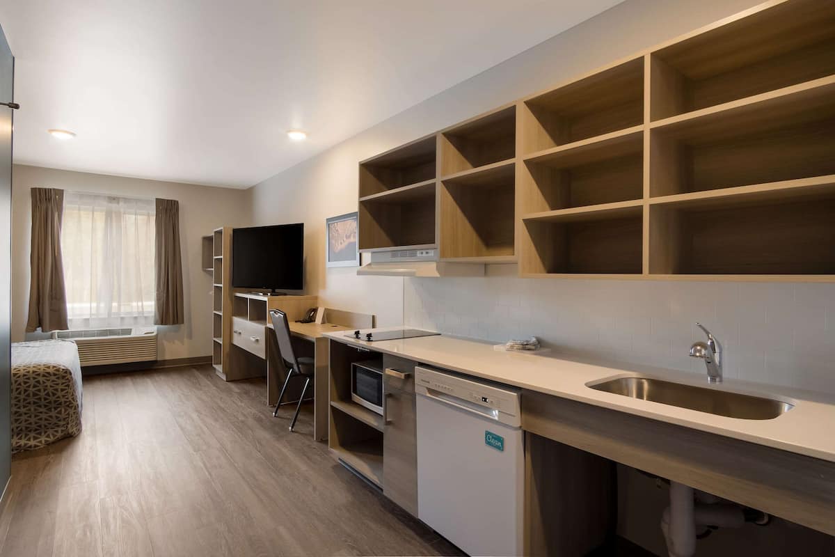 Individually furnished, desk, laptop workspace, blackout drapes