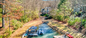 Spacious lake home with firepit, 3 fireplaces, pool table & shared amenities