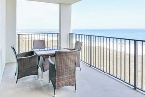 Outdoor dining - Awesome views from balcony overlooking beach! Centrally located in Orange Beach. (Orange Beach)