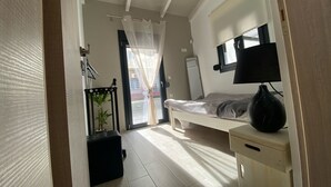 บ้านพัก, หลายเตียง | 2 ห้องนอน, เตารีด/โต๊ะรีดผ้า, Wi-Fi ฟรี, ผ้าปูที่นอน