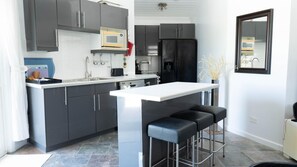 Fridge, oven, coffee/tea maker, toaster