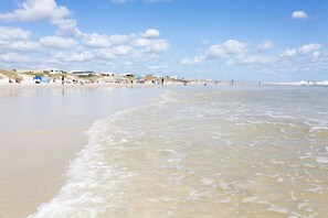 On the beach, sun-loungers, beach towels