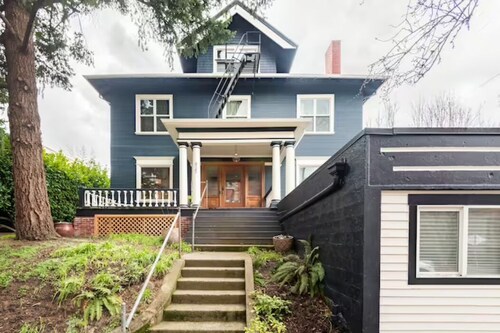 A pied-à-terre near bistros, shops, and sports stadium w/ parking and EV charger