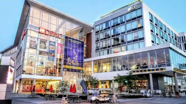 Experience the vibrant atmosphere of DPAC and MANASTEK, where modern architecture meets urban convenience.