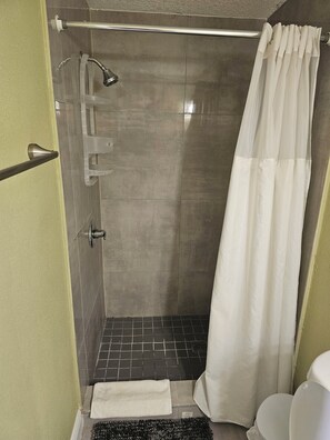Hair dryer, towels, soap, shampoo