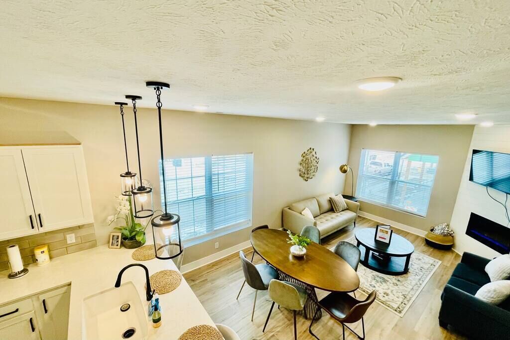 TV, fireplace, books, offices