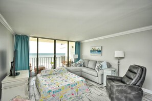 1 habitación, tabla de planchar con plancha y cuna de viaje 