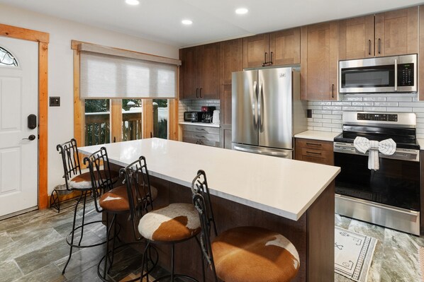 Condo, 4 habitaciones | Cocina privada | Refrigerador, horno, cafetera y tetera y tostadora 