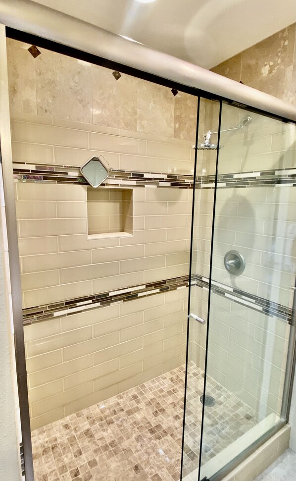 Shower, hair dryer, towels, soap