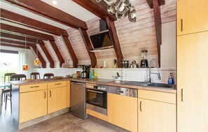Fridge, dishwasher, coffee/tea maker, cookware/dishes/utensils