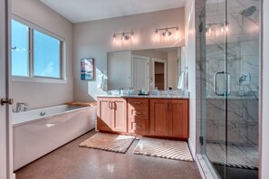 Shower, hair dryer, towels, shampoo