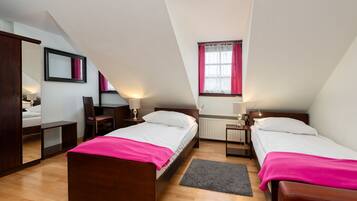 Superior Quadruple Room | Minibar, desk, laptop workspace, blackout curtains