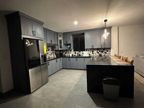 Coffee/tea maker, fridge, microwave, stovetop