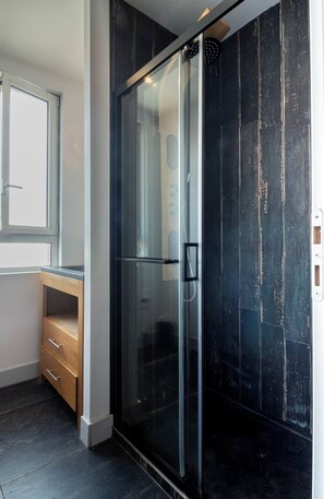 Shower, hair dryer, towels, soap