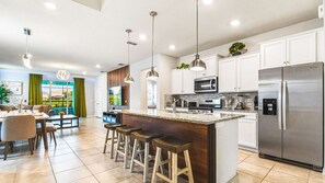 Fridge, microwave, oven, stovetop - Private Pool Escape with Disney-Themed Bedrooms (Davenport)