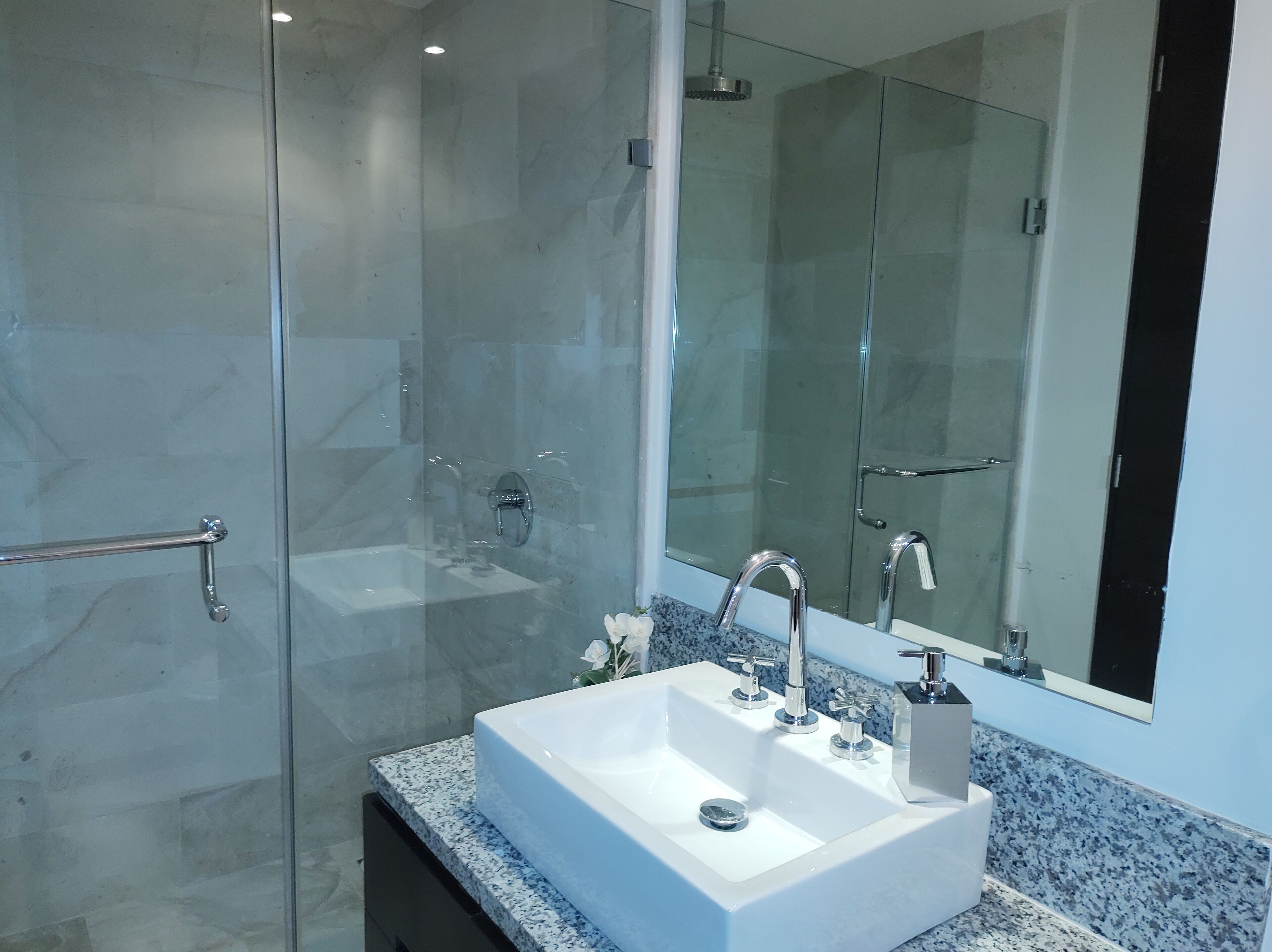 Shower, jetted bath, towels, soap