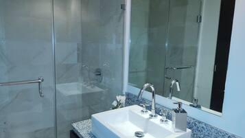 Shower, jetted bath, towels, soap