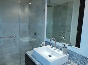 Shower, jetted tub, towels, soap