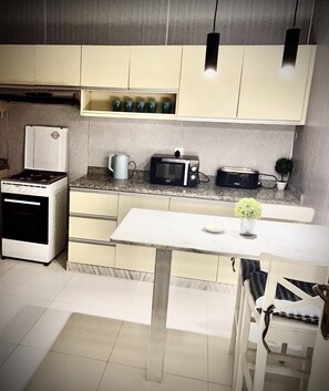 Fridge, microwave, oven, stovetop