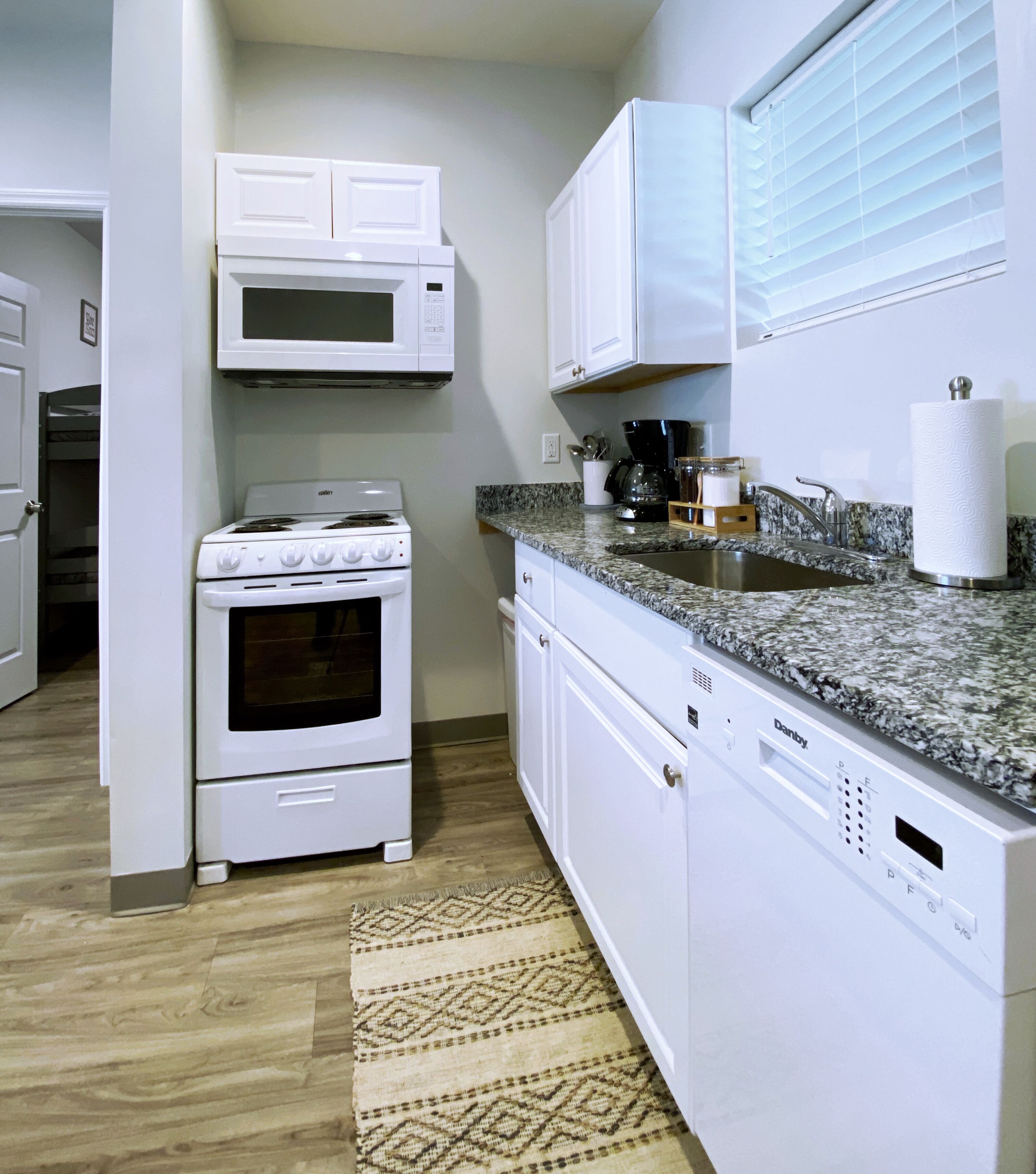 Coffee/tea maker, fridge, microwave, oven