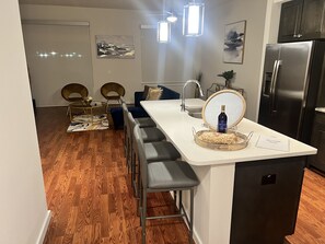 Enjoy meals in the kitchen with a central island, wine cooler, and dining area.