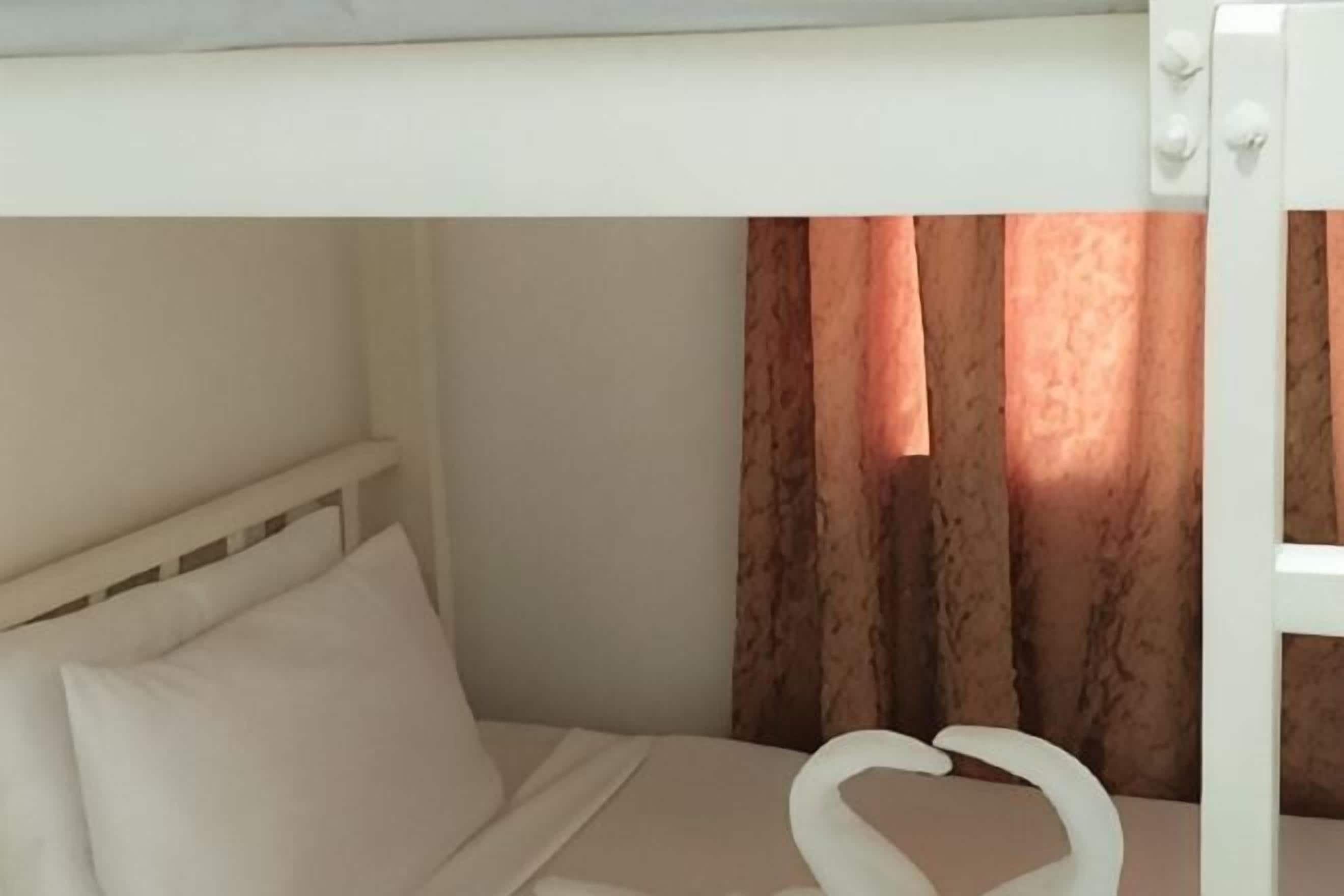 Desk, blackout drapes, free WiFi, bed sheets