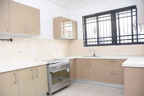 House, Multiple Beds | Private kitchen