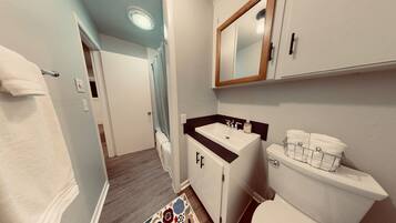 Hair dryer, towels, soap, shampoo