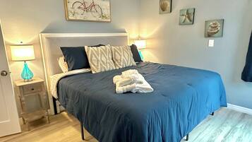 1 bedroom, desk, iron/ironing board, travel cot