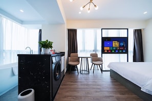 Superior Room | Living area | 55-inch LED TV with cable channels, TV