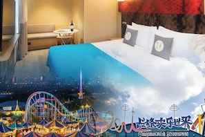 A hotel room with a bed, a small table, and a chair.