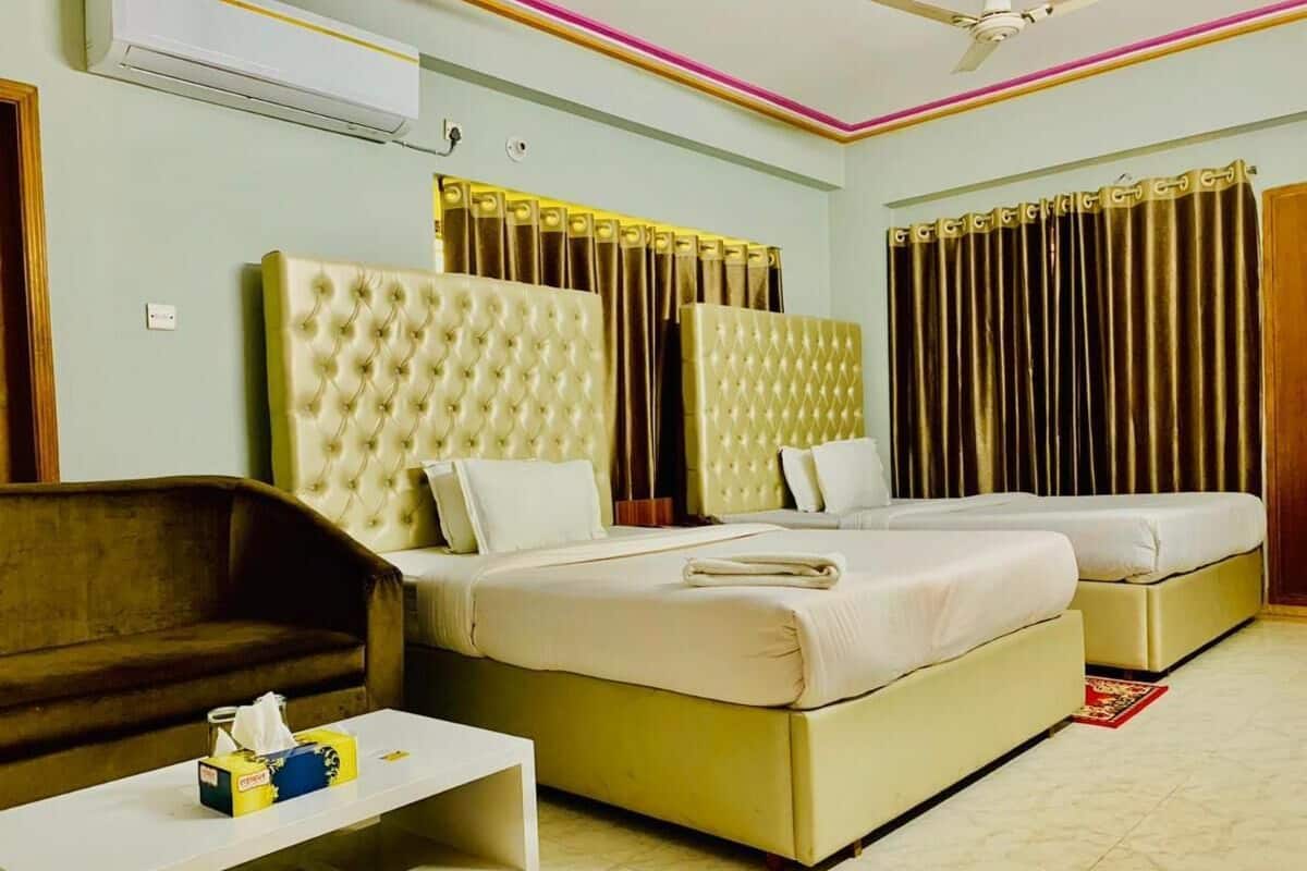 Deluxe Twin kamer | Donzen dekbedden, individueel gemeubileerd, een bureau, gratis wifi