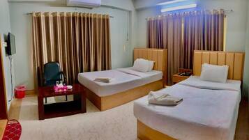 Deluxe Single Room, Non Smoking, City View | Down comforters, individually furnished, desk, free WiFi